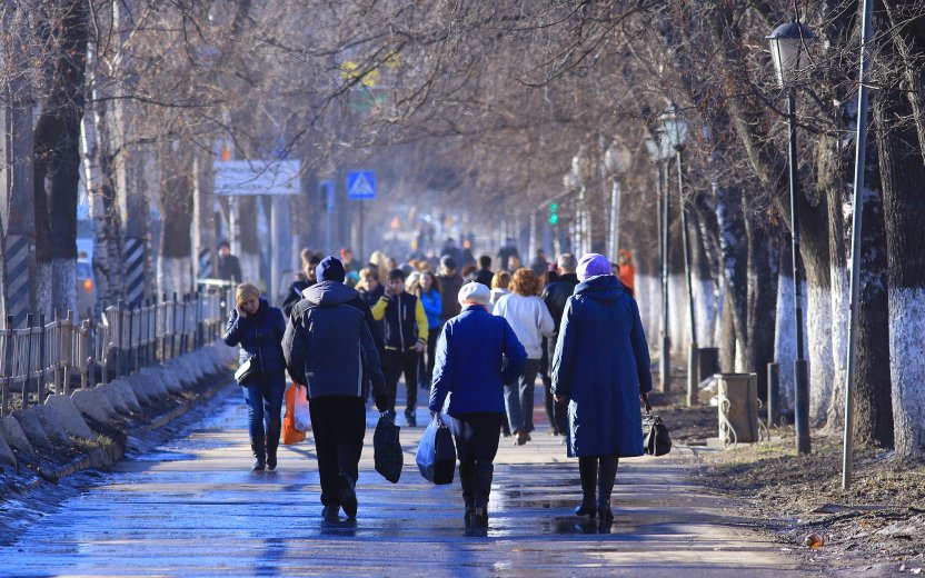 People walking down a street in Russia on a winter day.