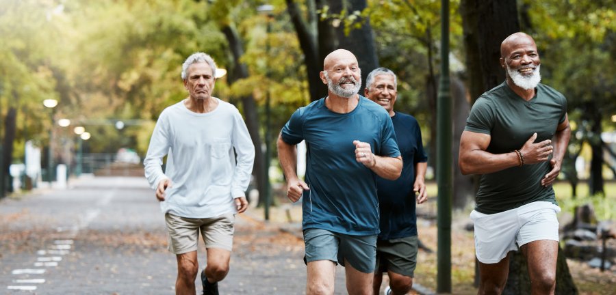 Aged runners in park