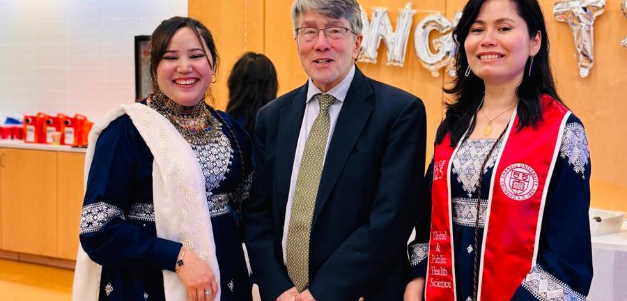 Khurshid Hussainy, Tim Devoogd, and Khadija Monis posing at a graduation celebration.