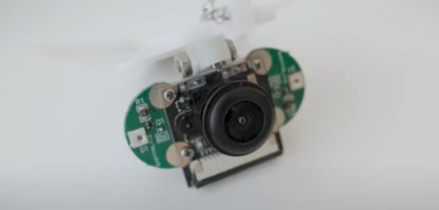 Close-up of a necklace that is also a mini computer.