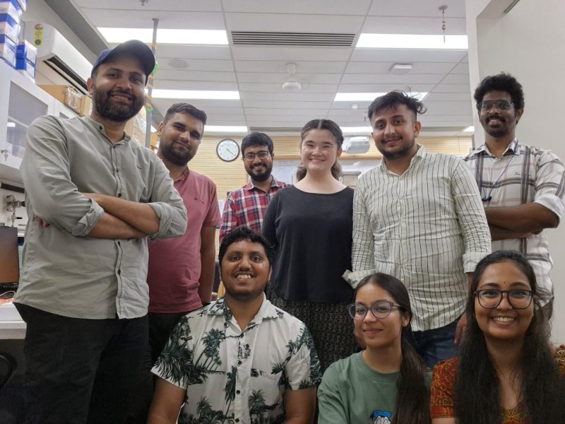 Haruna in the lab in a group shot with her coworkers.