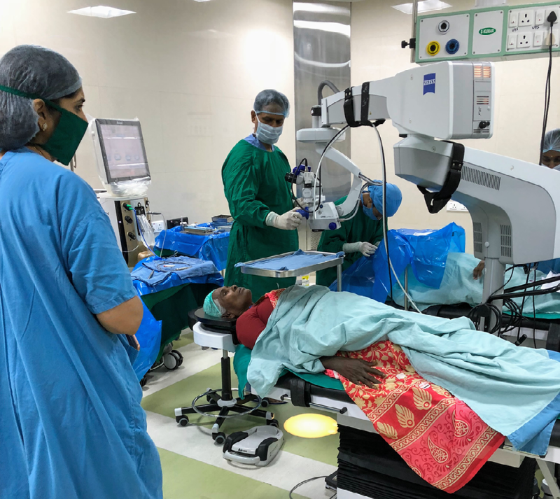 Medical professionals working on two patients