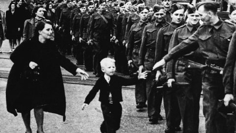 "Wait for Me, Daddy," taken by Claude P. Dettloff (Public Domain)