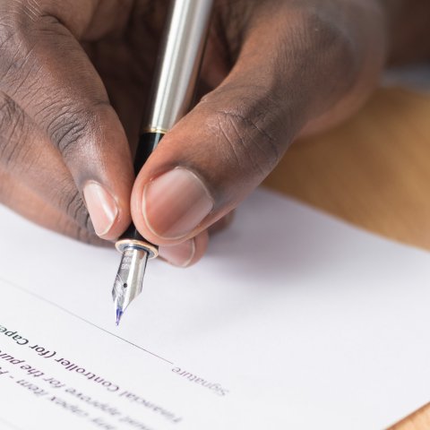 Hand signing contract