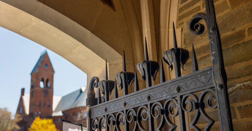 Barnes Hall as seen through the gates of Willard Straight Hall