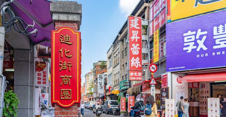 People walking around Dihua Street Market in Taipei, Taiwan.