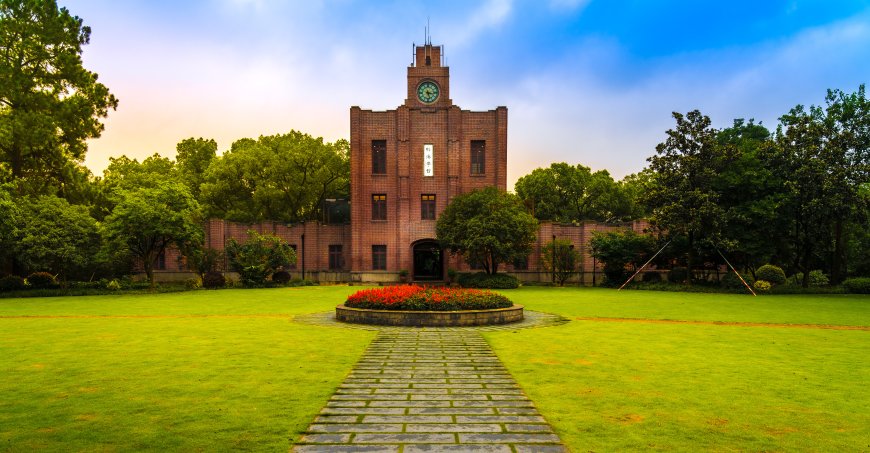 Building on Zhejiang University campus surrounded by a lawn.