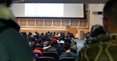 Students attending class in Alice Statler Auditorium