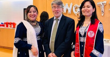 Khurshid Hussainy, Tim Devoogd, and Khadija Monis posing at a graduation celebration.